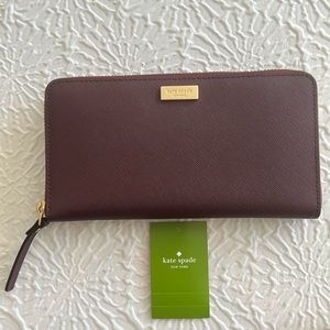 Kate Spade wallet mulled wine color. EUC. Like new!
